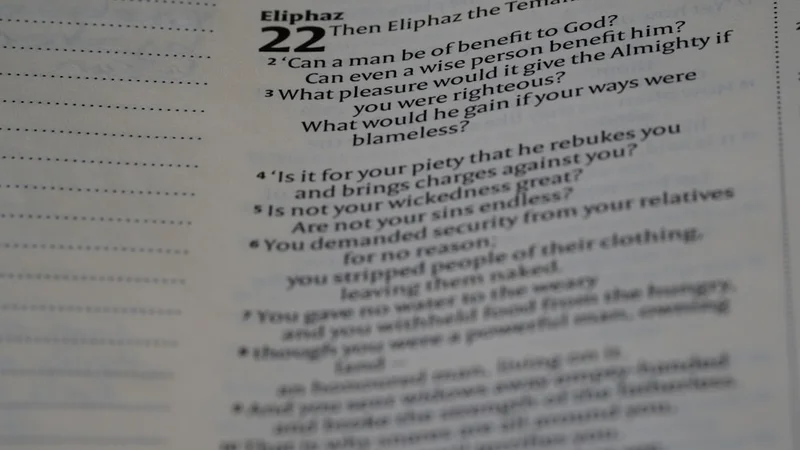 close-up of an open leather journal on a wooden desk beside a fountain pen, warm morning light slanting across the page